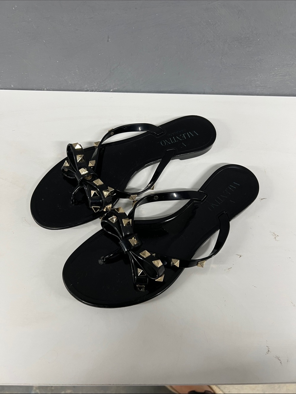 Valentino Black Jelly Bow Sandals with Gold Studs